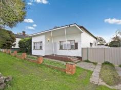 5 Haggar St Eaglehawk VIC 3556 Close to everything, especially the neighbouring tennis courts, this
neat weatherboard home presents as a great value buy in the Borough,
ideally priced for investors, renovators or first-home buyers looking to
enter the market. The location isnt the only thing going for this
property. Being a large allotment, theres definite subdivision
potential, and the location is incredibly quiet too, given that its just
a hundred metres from the bustle of High Street. Of course theres
work to do, but the bones of this house are reliable, with timber floors
(already exposed and polished in some rooms), and a surprising amount
of space that includes four bedrooms. Two of them have built-in
wardrobes, while the main bedroom has a reverse-cycle split-system. The central lounge room is a cosy space with a gas heater set in a brick fire surround and a wall-mounted air-conditioner. Theres
a second air-conditioner in the kitchen, along with plenty of cupboard
space, an upright electric stove, and room for a large dining setting. The
home has loads of storage too, with a two-door linen press right
outside the neat, three-piece bathroom, as well as cupboards in the back
porch and laundry. Right outside the back door theres approximately
20 square metres of undercover entertaining, and beyond is a big
backyard with lovely views of St Peters church as a backdrop. A double garage has secure gated access from the street. An inspection this weekend will confirm all the possibilities this property offers.
