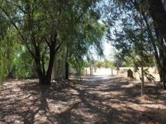 11 Caponi Rd Barragup WA 6209 Drive up the picturesque drive of the fully fenced property towards the
old Fibro home, set only metres from the river. This 4.96ha sub
dividable rural block can be split into two. You can keep one and sell
the other. Power and scheme water are connected to the property. Build
your dream home away from it all but only minutes from Mandurah's
Coffee Strip, Shops, Schools, Transport, Spud Shed & Freeway. Call Ian Lay today 0407 479 747 to arrange your viewing.