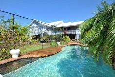 4 Kinmond Ave Wavell Heights QLD 4012 Property Information Tender Date:Tuesday 14 Oct 4:00 PMHighlighting the quintessential family lifestyle 'Nindethana' offers immense appeal to all who visit. Contemporary renovations blend with distinctive period character enhance this elegantly detailed home. Sweeping views to Moreton Bay from an elevated 1341 m2 sqm LMR corner parcel which captures those bay breezes. The home is light, spacious and superbly styled. Notable features include: - Full sized north south grass tennis court - Beautiful fully fenced in-ground swimming pool - Generous accommodation with 3 bedrooms, master with ensuite and walk in robe surrounded by stunning leadlight windows - 3 very large bathrooms - Ducted reverse cycle air conditioning - Sunroom with north eastern views capturing those bay breezes - Large master chef kitchen with servery to large covered entertaining deck with views - Separate built in study - Additional rooms and amenities under for those weekend house guests - Formal dining room with timber door opening casual family rooms - Central hallway takes you to the bedrooms and bathrooms. - Family neighbourhood close to schools, transport and village shopping Private viewings available on request or call for viewing times. Land Size 1341 sqm Tenure Freehold Property condition Good Property Type House House style Colonial Garaging / carparking Closed carport Construction Timber Joinery Timber Roof Iron Walls / Interior Timber Flooring Carpet and Polished Kitchen Open plan, Dishwasher, Separate cooktop, Rangehood, Extractor fan, Double sink, Waste disposal, Breakfast bar, Pantry and Finished in Timber Living area Formal dining Main bedroom King, Built-in-robe, Walk-in-robe and Ceiling fans Bedroom 3 Double and Built-in / wardrobe Bedroom 4 Double and Built-in / wardrobe Additional rooms Family Main bathroom Bath Laundry Separate Workshop Combined Aspect North, East Outdoor living Entertainment area (Covered), Pool (Inground and Concrete), Tennis court, Verandah Fencing Partial Land contour Flat Grounds Manicured Water supply Town supply Locality Close to schools, Close to transport, Close to shops