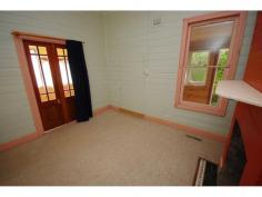 55 Cascade Street, KATOOMBA This property comprises a basic
weatherboard and iron house on a treed block of approx. 845m2 in a
convenient position, an easy 10 minute walk to town. The home
consists of an entry area, lounge room, kitchen with gas cooking, small
simple original bathroom and bedroom. In addition, there is a sunroom
overlooking the garden. The garden features some lovely fruit trees and
the property picks up some good mountain views. This is
potentially an affordable acquisition for the investor or first home
buyer with plenty of room to further improve the property. **
This property is only available for inspections from Tuesday, 9th
September 2014. Please call Theo Poulos Real Estate on (02) 4782 1888 if
you would like to make an appointment.