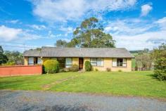 699 Mooreville Rd Mooreville TAS 7321 TYPICAL AUSSIE SETTING Set amongst the gum trees stands this very well built brick and tile home on approx 1.7 ha (4.2 acres) with a spring fed dam on the eastern boundary, very good fencing and grazing land plus friendly neighbours waiting to make you feel very welcome. The residence features 3 bedrooms all with robes, master with ensuite, very neat bathroom, quality built kitchen with an abundance of bench space, dining/family room opening onto large deck sunny lounge plus storage/office and single garage and carport downstairs. With near level lawns and gardens surrounding the home plus double garage size workshop with a wood heater in the man cave. Many boxes will be ticked after inspecting this typical Aussie style rural residential property.