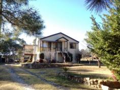 246 Watters Rd Ballandean Stanthorpe Qld 4380 Have you dreamt of a rural lifestyle but can't afford to get in to the
market ?? Well here's your chance. A beautiful 51.5 Ha (127.2 Acres)
property which has a mix of cleared grazing land and natural bushland
with waterfalls and access to Smith's Creek plus a truly unique home
which has been loved by its owners for many years.
The home is in need of some updating but has many attractive features and lovely gardens surrounding it.
The sheds are excellent and there's even one for the caravan. There
is a good set of cattle yards on the block and the fencing is stock
proof.
This lovely lifestyle property has a lot to offer and priced to sell.
For further enquiries or to arrange an inspection, contact Sally Rowen on 0417 633 969.
