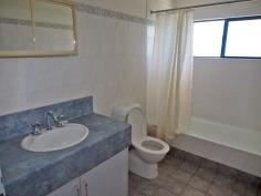 4/5 Aneura Pl Sadadeen NT 0870 This unit is too good to pass up with the First Home Buyer Grant coming to an end in December 2014. Get in before the end of the year to get your $25,000 grant! You will feel the benefit in your back pocket of a privately managed body corporate. With this you are essentially just paying the raw costs of water and insurance and none of the other costs that come with a managed unit complex. Positioned at the back of the complex and sitting on a hill, this great two bedroom townhouse is worth a look for both its great design and great views! The open plan tiled living/dining and kitchen boasts ducted evaporative air conditioning throughout and ceiling fan. Downstairs the internal laundry also has an extra toilet. The kitchen features gas cooktop and oven, plenty of cupboard and bench top space and sliding door that leads out to the backyard. Upstairs the main spacious bedroom boast ceiling fan, built in robes, carpet and large private balcony with fabulous views of the Ranges. The other bedroom also features ceiling fan, split air con, built in robes and carpet. The central bathroom has bath over shower, vanity and toilet inclusive. Outside, the veranda runs along the front and continues around the side so there is plenty of choice of where to sit and enjoy the outdoors. There's enough room for a vege patch too. The unit features a single car spot with plenty of other parking spots and the benefit of a privately managed body corporate which will help keep your costs down! Call for a viewing today!