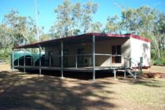 Launceston Rd Dundee Beach NT 0840 Dundee Delight This is a great weekender or permanent family home which has recently been certified (completed 2013) which is great news for the purchaser. It is set on 30 acres of pristine bushland with lovely tall timber walking trails throughout the block together with a large estuary at back of block. It is in a very quite location set back from the road but is still close to all the amenities of Dundee. This 2 bedroom,2 toilet 1 bathroom home comes fully furnished has mains power with generator change over together with 2 x 25000 litre water tanks, gas hot water and cooking facilities, with a great outdoor deck. There is a large lockup shed 6 x 9 mtrs with two car parking bays there is also a generator shed and generator for backup power for those stormy days and nights.