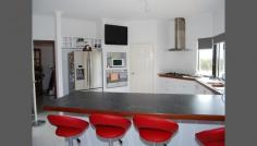 276 Gosnells Road East, Orange Grove, WA 6109 Do not miss out on this once in a life time opportunity. The owner had just dropped the price by $700,000. Due to unforeseen circumstances the owner must sell and we think this property is now defiantly the best valued property in the area. What do you get? 2.01 ha pristine land overlooking the Jadran's Vineyard with the back-drop of the city of Perth as the block is one of the few elevated properties in the area! Near new 4 bedroom 2 bathroom home with twin A/C, built in wood fire, Spa entertainment room with city views, large office/study, Master bedroom fit for royalty, massive kitchen overlooking vineyard and city, solar power plus much much more!! The Icing on the Cake; A mammoth 301+ sqm concrete slabbed shed with entrance and exit built for the Truckie with mechanic pit power and a hell of a lot more.