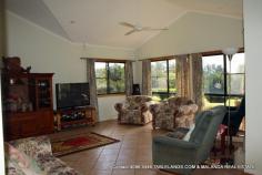 Malanda, QLD 4885 Consider this modern, elegant four-bedroom home on 1 hectare (2.5 acres) in a select area close to Malanda. This neatly presented brick veneer home is surrounded by sweeping tracts of lawn, established retained gardens and is framed by a rainforest backdrop. A bitumen driveway from the front gate to the house and two-bay shed keeps maintenance and mess during the wet weather to an absolute minimum. The kitchen with good storage including pantry and a stunning feature timber bench-top overlooks the verandah; the ideal spot for al fresco dining to enjoy the manicured surrounds. Practical tiles cover all living and wet areas with bedrooms having the added comfort of carpeted floors. The property is on town water but also has rainwater supply. There’s not a thing out of place here; beautifully presented, conveniently located – inspect today and make an offer! 1 Ha (2.5 acres) 4 brms; 4 built in Brick veneer Lowset; steel framed 1 bathroom 2 Verandahs Fenced Gas HW Ceiling fans 2 bay shed Garden shed Town water Rainwater Veg garden