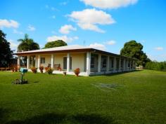 261 SEXTON Highway Brandon Qld 4808 Quality block home, with machinery sheds, on 9210 sqr mtr block. - Quality block, 2 year old home (over 400 sqr mtrs). - Quality tiles, fully airconditioned. - Brilliant Tassie Oak kitchen. - 3 large bedrooms + office or 4th bedroom. - Verandahs on all 4 sides. - Machinery sheds (15 bays) with accommodation (suitable for harvester & haulouts). - Situated on the edge of town. A copy of the Sustainability Declaration is available for viewing at our office. - See more at: http://www.landmarkharcourts.com.au/Property/582821/LTY2946/261-Sexton-Highway#sthash.hnFawxJj.dpuf