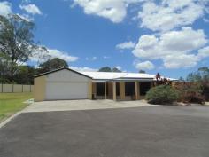 21 Roberts Road COOROY Qld 4563 GREAT YARD FOR LANDSCAPERS.... Approx 9 yr old 4 bedroom, 2 bathroom rendered brick home Formal lounge and dining, gas stove top 3 Daikin reverse cycle air conditioners, fans throughout Gas connection in kitchen and entertainment area Fully enclosed outdoor entertainment area 3kw solar system/gas hot water 9m x 18m shed with shower & toilet, 3 phase power 7m x 7m colour bond shed with power 2 colour bond dog kennels with 2 metre high fencing Full dog proof fencing, fenced into to 4 separate areas 2 x 4 metre electric entrance gates Bitumen & concrete driveway to house & shed Approx 70 fruit trees fully irrigated 1.08ha (just over 2.5acres)