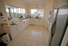 12 Diggers Beach Rd, Coffs Harbour NSW 2450 This house has amazing views out to the Mountain and ocean, from the lounge, kitchen and entertaining decks. The house is mostly tiled, with bedrooms having carpet; there is a light, bright and modern feel throughout the house. An entertainer's delight with two outdoor options, either by the pool, or on the expansive veranda, taking in the view. Both are easily accessible from the kitchen, so the cook doesn't have to be out of the party. Ideally situated within only a couple of minutes' walk to popular Diggers Beach, and the Big Banana. The house is also on the School Bus route, and within close proximity to Park Beach Plaza. Downstairs is an oversized double garage with internal access and a rumpus room or 5thbedroom with its own ensuite. Upstairs the 4 bedrooms, living areas, entertaining areas and pool, are on one level. This is a sensational home for a family that loves the beach, and expects quality.
