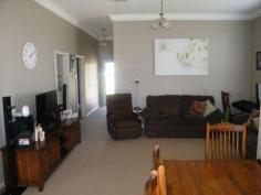 1 Conlon St Quirindi NSW 2343 3 bedroom weatherboard home, freshly painted and fully renovated. Situated on a large 954.8sqm block in a quiet location. All bedrooms have ceiling fans and ducted evaporative air conditioning throughout. Wide timber verandahs on Northern and Western side. Open plan kitchen/dining area ,living area and bedrooms carpeted. Ducted evaporative air conditioning and slow combustion wood heater in living area. New double lockable garage with cement floor as well as carport. This is a large block of land , fully renovated home ,set in a quiet street. Great value , would suit first home buyer or investor, well worth inspection.