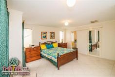 58 Dean Rd Jandakot WA 6164 PACK THE GOLF CLUBS....BRING THE FAMILY TOO! Web property id: TRE150 You're invited to our HOME OPEN this coming SUNDAY from 12:00-12:40PM. This quality Ross North built double brick and tile home on a huge 717sqm block backing onto the fairway is the ultimate residence for the active family, and if you’re a golf aficionado you’ll be in seventh heaven! Complete with four large bedrooms, three bathrooms, formal lounge and dining, spacious open plan family/living and games, generous sized kitchen, children’s activity/study, big gabled alfresco entertaining patio, double lock up garage with rear roller door and garden shed on a fully fenced block with delightful established gardens including a variety of fruit trees; this is a very inviting home in a tightly held location. With 258sqm of living space, it truly is a substantial sized home, and additional features which enhance comfort and appeal include: cosy gas log fireplace, ducted evaporative air-conditioning, gas storage hot water system, tiled floors throughout for easy maintenance and a wonderful floor plan to facilitate separation of living – this is a home built to accommodate the needs of the modern family. An open plan kitchen with abundant storage, stainless steel appliances including 900mm gas oven and cook top, range hood, dishwasher and tiled splashback is a very functional design and there is ample room for a few helpers to assist without getting under the feet of the chef! Whilst there is so much living and entertaining space inside the home – it’s the huge covered alfresco patio that will attract visitors and is the perfect platform for all social occasions. As inviting as this home is throughout, it is equally lovely outside, framed by established vegetation with a large shady tree in front yard, plenty of room for a pool, the privacy of no neighbours at the rear and you can eat from your garden – avocadoes, mangoes, lemons, limes, plums and grapes! With a fully reticulated water system, maintenance is minimal...the hard work’s been done; you can just enjoy the fruits of someone else’s labour! Located in the ever popular and highly sought after Glen Iris Golf Course Estate, this is a quiet, safe, family-friendly neighbourhood close to all amenities including: Kwinana Freeway, Roe Highway, the new Fiona Stanley Hospital, shops and public transport. The golf course, clubhouse and Iris Restaurant are all at your doorstep...literally. It’s not too late to be in your new home prior to Christmas – enormous value on offer; act immediately. Proudly Marketed by THRIVE Real Estate with Derick & Bev PITT - We're Living & Selling on this Fabulous estate.