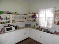 Gatton QLD, 4343 Roomy lowset 5 bedroom home on concrete stumps. The country style kitchen and dining room boast polished timber flooring and the separate lounge room is carpeted . There is a good sized front porch/verandah and new front fence. Large block with fully fenced back yard with 3 car carport and 4m x 9m shed with power. Walking distance to town and services. The possibilities are endless and including continuing with current tenant, renting rooms individually, renovating/extending the house or just a great house for a large family to live comfortably.