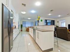 21 Amanda June Close Joyner QLD 4500 Inspections Inspections by appointment only. If
you are searching for a very peaceful location and an ultra spacious
home, consider all the options available to you with this wonderful
property. The home was constructed in 2009 and designed to
capture the Bay breezes and to reduce the summer heat. A stunning
rendered façade leads to the formal entry with vaulted ceiling and wall
niche for your prized photographs or artwork. You will notice the
immediate feeling of space and light with the 9ft ceilings and large
picture windows throughout this home. Do you have your wish list? You may enjoy ticking off the features: 5 spacious built in bedrooms; The master bedroom incorporates a large walk in robe; Fantastic
ensuite with bath for relaxation, large separate shower, separate
toilet and dual basins in the spacious, modern vanity; 3 distinct internal living areas comprising a formal lounge, family room and rumpus room; Separate dining adjacent to the kitchen will accommodate a larger dining setting; Centrally
positioned white 2-pak designer kitchen with granite benches, triple
pantry AND semi Butler's pantry, quality Bosch stainless steel
appliances includes dishwasher and fan forced oven, ceramic cooktop and
rangehood. Massive under roof outdoor alfresco with space for a large setting plus table tennis and occasional lounge chairs; 2 car, remote access garage with internal entry to the butler's pantry; 2 x 5000 litre water tanks Gas hot water; Ducted air-conditioned comfort; Ducted vacuum Security Alarm Wide
side access to the huge fenced backyard where children and pets can run
free - large enough for a weekend footy game or for a family cricket
match; Pleasing landscaped gardens; Quiet cul-de-sac position; AND there is so much more for you to discover..... Just
a 2 minutes drive to Genesis Christian College and to the Warner Shops.
There are some lovely walking trails through a rainforest setting and
along the river course right through to the AJ Willey bridge at Petrie.
If you love produce markets, it's only are few minutes drive to the
North Pine Country Markets. Come along and discover all that this stunning property offers. You and your family will be captivated!