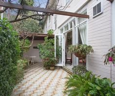 5/275 Edgecliff Rd Woollahra NSW 2025 A peaceful mews-like setting, sunny north aspect & generous proportions make this
townhouse a wonderful easycare home. Secluded from the road at the end of a private drive,
Kew Place is a boutique collection of 12 residences reminiscent of an English mews &
located between the chic attractions of Queen Street Village & the leafy tranquillity
of Cooper Park. The first time offered in over 30 years, it features a spacious dual
level layout with potential to create a fourth bedroom or study & is close to
Edgecliff station & Westfield Bondi Junction.
Whisper-quiet rear setting, private entry and wide foyer Bay fronted living room bathed in all day northerly sun Dining room opens to a wisteria-framed courtyard Modern granite kitchen, breakfast room or sitting room 3 large bedrooms with built-ins, fresh main bathroom Sun filled master bedroom with en-suite bathroom, walk-in robe sunny balcony & park views Enormous laundry room with scope to create a 4th bed Downstairs powder room, wine cellar, visitor parking Double garaging with mezzanine storage and internal access Generous indoor/outdoor living, scope to update