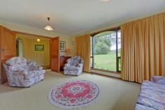 699 Mooreville Rd Mooreville TAS 7321 TYPICAL AUSSIE SETTING Set amongst the gum trees stands this very well built brick and tile home on approx 1.7 ha (4.2 acres) with a spring fed dam on the eastern boundary, very good fencing and grazing land plus friendly neighbours waiting to make you feel very welcome. The residence features 3 bedrooms all with robes, master with ensuite, very neat bathroom, quality built kitchen with an abundance of bench space, dining/family room opening onto large deck sunny lounge plus storage/office and single garage and carport downstairs. With near level lawns and gardens surrounding the home plus double garage size workshop with a wood heater in the man cave. Many boxes will be ticked after inspecting this typical Aussie style rural residential property.
