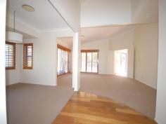 7 Mornington Terrace ROBINA Qld 4226 An architecturally inspired, generously proportioned 4 bedroom home with high ceilings, large separate living areas and huge pool plus waterfall and perfectly positioned in a quiet and convenient cul-de-sac with park and waterfront homes opposite. ~ Ducted zoned reverse cycle air conditioning ~ North facing pool and outdoor entertaining area ~ Large inspiring entrance foyer ~ Timber shutters ~ Certified pool fencing ~ Gas hot plates and gas heater for pool ~ Ensuited master bedroom with spa bath ~ Overseas owner has priced for immediate sale. Holiday all year around yet still be within walking distance to shops, transport etc.