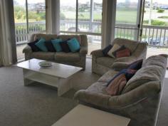 1/3 Possum Pl, Dalmeny, NSW 2546 Great position, great apartment located in Dalmeny directly across from the beach. Three
bedrooms, lounge, dining and kitchen, good sized deck for soaking up
those rays and enjoying a barbie along with a tipple or two. The garage has a lockable storage area ideal for your bike, surfboard and the like. Fully set up as a holiday unit, completely furnished.