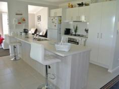3 Hakea St Russell Island QLD 4184 Display Home Quality 1
Years Young, this 3 bedroom home with 2 bathrooms. located right in the
heart of town and positioned on a flat block of land. Easy access to
property and all finishing's will impress. The master bedroom has a
large walk in wardrobe and ensuite. Fully fenced with the most beautiful
manicured gardens. The owner has also put in a shed for the man
of the house with a side Patio to hang out with the mates. But dont
forget theres also an impressive deck at the house. Carport is also attached to home with plenty of room in the back yard for children and family pets. Contact listing agent today Property Snapshot Property Type: House Land Area: 536 m2