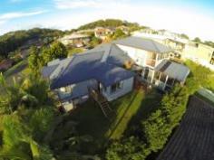 2 Captains Lookout Port Macquarie NSW 2444 The current owners have accommodated their extended families in comfort and style. The house now has 3 separate wings all with privacy and full facilities in place. The home which is around 380m2 has been recently refurbished and extended. Slightly elevated to take in the cooling breeze the home is also quite private. Only a couple of minutes drive in either direct will see you at Shelley Beach, Port Macquarie CBD or Base Hospital. The home would be perfect for the largest of families or could well be purchased by a family wishing to support their extended family for health or financial support. The homes internal features include, 6 x 6 metre enclosed sunroom, 3 impressive bathrooms, study room, a very large master bedroom with walk-in robe and sitting area to enjoy the northern winter sun.