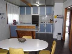 2 Tribe St Bicheno TAS 7215 Corner Position North facing residence close to the centre of Bicheno with dual access off both Burgess Street and Tribe Street into the carport. Two large double bedrooms both with built in wardrobes and carpet flooring, central passageway leads through to kitchen/dining and separate lounge area. Established garden with a number of trees for privacy from the street, some vegie beds, apple tree, garden shed and a workshop. Inspection is by appointment.