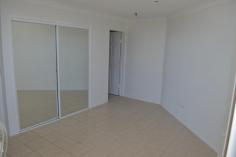 96/114 The Esplanade, Surfers Paradise QLD 4217 In one of the Gold Coast’s icon buildings – Focus Apartments. With two large bedrooms the apartment encompasses 94 square metres of living space. With North views and ocean outlook, there is plenty of natural light and sun all day. Offering a fully renovated large “entertainer” style kitchen with modern appliances including a dishwasher, four balconies (one off each room) and a large living/ dining; the apartment is generous in its proportions. The full renovation of the apartment is very recently completed. Including a separate laundry, main bathroom with large bath and separate shower and a large separate lock up garage with plenty of storage space.