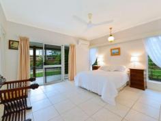 15 Agincourt Street PORT DOUGLAS QLD 4877 This tropical retreat inspired property, plus an additional stand alone home studio/office/seniors quarters/entertainment/rumpus area... Or just simply a 4th bedroom. With own bathroom and kitchenette needs to be viewed vigorously. As quality and design like this is in short supply and the high demand will have it sold quickly.
Indoor & outdoor spaces combine as you gravitate to the outdoors, along sandstone pave ways through out your manicured gardens. Not only do you have a full length undercover patio to enjoy the serenity but a choice to stroll to your very own dedicated entertainment area capsulating water views and water fall feature across the pool from your alfresco dinning area.
Large Gourmet kitchen, soaring ceilings & spacious entertainment areas.
The home has upgrades not seen in normal homes of this nature. Along with the added advantage of the current owners passion for detail and on-going commitment in their pride of up keep.
On arrival, you will feel immediate security and that feeling of welcome and calmness. The modern space perfectly suited to the modern tropics. With 3 bedrooms and 2 bathrooms in the main residence.
Your master bedroom en-suite, having an impressive WOW factor as you walk in. Along with ability to open your master bedroom out to the full length patio . Over sized double-car lock-up garage plus an additional undercover auxiliary arrival car bay. Great built in storage, linen, robes and quality finishes and features throughout.