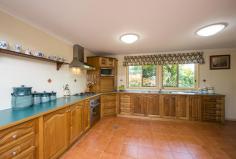 51 Ironmonger Street Calliope Qld 4680 Price Price Guide $600,000 - $650,000 Suburb Calliope Postcode 4680 Property Type Acreage/Semi-Rural Bedrooms 3.5 Bathrooms 1.5 Carspaces 9 Land Size 5 Acres YOUR OWN SANCTUARY ON TOWN DOORSTEP! Superb small acreage on the door step of town. With this package you can have it all! Literally 3 minutes to Calliope, the kids could walk to school. 5 acres of useable land, gorgeous views, spacious home and great sheds. This home has not seen to the market for over 30 years. The current owners have loved the lifestyle and maintained the property the beautifully over this period. Surrounded by glorious easy care gardens privacy is assured. A completely transformation took place 14 years ago to bring the home to its current standard. Entertaining options are plentiful with rural or mountain views from every corner. Inside the house has been design to capture these for nearly every room. The chef is the home with love the amazing Black Wattle kitchen with gas cook top and electric oven, range hood and loads of storage and bench space. Tiled open living space beautifully appointed. Massive laundry with storage that anyone would be envious of and then there is the linen cupboard. BIG bedrooms all are built-in and have sliding doors to access outside, giving great ventilation. Huge bathroom with floor to ceiling tiling, separate bath and shower and corner to corner vanity. Two 3 bay sheds both with power. 1 with 2 automatic roller door, new paint and there is even a toilet! The man around the home will be in his element. Add 100+ Mangoes, full fencing, town water and bore. Seeing is believing here.