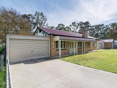 556 Battunga Road Echunga SA 5153 Opportunities Galore! 5463sqm, Bore, Solar Panels A solid brick home situated perfectly just out of the beautiful Adelaide Hills town of Echunga and under 40 minutes drive from the Adelaide CBD. Surrounded by just over an acre of land (5463 sqm), this neat 3 bedroom home offers up endless opportunities for enhancements, a growing family, the gardening enthusiast or all of the above! With perks such as parking for 8 cars, ample shedding, both good bore and rain water storage (100,000 litres plumbed to the home) and more, this property provides opportunities for living and growing in a beautiful part of the Adelaide Hills community. The home itself boasts an open plan kitchen/dining area providing plenty of bench space, a living area with a fireplace for chilly winter nights, 3 generous bedrooms, a quiet office space, and a separate laundry, making it perfect for the individual, couple or growing family! Along with this, the property offers an outdoor deck area which is entirely flexible to be either completely enclosed with roller shutters or opened up to reveal the extremely spacious back yard. General Features Property Type: House Bedrooms: 3 Bathrooms: 1 Building Size: 168.80 m² (18 squares) approx Land Size: 0.55ha (1.35 acres) (approx) Indoor Features Air Conditioning Outdoor Features Garage Spaces: 8 Other Features Tenure: Freehold Property condition: Good Property Type: Land, House House style: Conventional