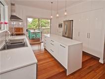 11 Duke St Brighton QLD 4017 Fully Renovated 500m To The Waterfront! Offers Over $539,000 From the moment you open the front door you will be impressed by this fully renovated home where open plan living flows out to the large covered deck overlooking the leafy backyard. The kitchen comes complete with an island bench, granite bench tops, masses of storage and stainless steel appliances including a 900mm cooktop/ oven and dishwasher. Both bathrooms are immaculate featuring floor to ceiling tiles and waterfall shower heads. The main bathroom has a bath and the ensuite boasts an extra -large shower. The master bedroom is carpeted and features a large walk-in-robe and ensuite. The home features polished floors, ornate cornices, freshly painted inside and out, lock up garage, carport and loads of storage under. The yard is fully landscaped, fully fenced and comes complete with your own private courtyard. The Brighton shops are at the end of the street, and waterfront an easy walk. I could go on forever but the best thing to do is inspect, which will surely follow with an offer to purchase this immaculate property. Map Data Terms of Use Report a map error Map Satellite 100 m Property Type House Property ID 11686100085 Street Address 11 Duke Street Suburb Brighton Postcode 4017 Price Offers Over $539,000 Land Area 405 sqm