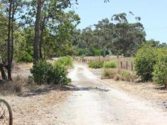 11 Caponi Rd Barragup WA 6209 Drive up the picturesque drive of the fully fenced property towards the
old Fibro home, set only metres from the river. This 4.96ha sub
dividable rural block can be split into two. You can keep one and sell
the other. Power and scheme water are connected to the property. Build
your dream home away from it all but only minutes from Mandurah's
Coffee Strip, Shops, Schools, Transport, Spud Shed & Freeway. Call Ian Lay today 0407 479 747 to arrange your viewing.