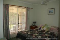 Malanda, QLD 4885 Consider this modern, elegant four-bedroom home on 1 hectare (2.5 acres) in a select area close to Malanda. This neatly presented brick veneer home is surrounded by sweeping tracts of lawn, established retained gardens and is framed by a rainforest backdrop. A bitumen driveway from the front gate to the house and two-bay shed keeps maintenance and mess during the wet weather to an absolute minimum. The kitchen with good storage including pantry and a stunning feature timber bench-top overlooks the verandah; the ideal spot for al fresco dining to enjoy the manicured surrounds. Practical tiles cover all living and wet areas with bedrooms having the added comfort of carpeted floors. The property is on town water but also has rainwater supply. There’s not a thing out of place here; beautifully presented, conveniently located – inspect today and make an offer! 1 Ha (2.5 acres) 4 brms; 4 built in Brick veneer Lowset; steel framed 1 bathroom 2 Verandahs Fenced Gas HW Ceiling fans 2 bay shed Garden shed Town water Rainwater Veg garden