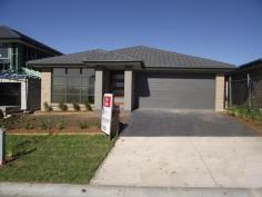11 Rixon Street Oran Park NSW 2570 Modern Family Home in New Estate Located in the iconic Oran Park, offering four (4) bedrooms with built in wardrobes, private ensuite for the master bedroom, open plan tiled living & theatre room. All the modern conveniences of DUCTED AIR CONDITIONING, covered outdoor entertaining area, remote controlled double lock up garage and low maintenance gardens - you will be able to sit back, relax and enjoy. Call now on 9602 2100 to express your interest. General Features Property Type: House Bedrooms: 4 Bathrooms: 2 Bond: $2,120 Indoor Features Toilets: 2 Air Conditioning Outdoor Features Garage Spaces: 2 Other Features Built-In Wardrobes,Close to Schools,Close to Shops,Close to Transport,Garden