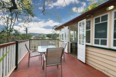 42 Dovercourt Road, Toowong, QLD, 4066 Perched high on a hill with panoramic views across Toowong to Mt Coot-tha, this classic Queenslander on 630sqm offers young families the joy of a secure grassy yard to enjoy time together and an established, fully enclosed backyard / veggie patch to tend to (serviced by a 5000 litre water tank with pump.) Situated 5.7km (10 minutes) from Brisbane City and approximately five minutes from the University of Queensland, the property has been a loving home enjoyed by the same family since 1975. With solar hot water and a big family kitchen / dining area connected to a rear patio, the living area opens to a north east aspect that captures breezes in summer and sun in winter while on the upper level still, another deck offers spectacular sunsets to enjoy. Downstairs, this property has a large downstairs living area – additional space perfect for growing needs. Located on a very quiet street, this is a special, private property to enjoy.