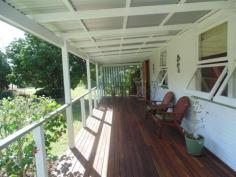 61 Charles Street
KENILWORTH Qld 4574 This 4 bedroom home is a Cracker..... New Kitchen Formal lounge & spacious family room 2 bathrooms & toilets Covered front verandah Enormous covered deck with great views Hardwood chamferboard on exterior walls Double carport and double roller door garage for 4 cars on 800m2