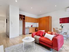 4/99 Oxford St Collingwood VIC 3066 A superbly maintained warehouse apartment within the historically significant Foy and Gibson building. Spacious and light filled this first floor apartment features two double bedrooms (master with BIRs), open plan kitchen/living opening to large (covered) outdoor terrace/winter garden, central bathroom, Euro laundry and two secure undercover car parks (tandem). Other features include air conditioning, polished timber floor, stone bench tops. An unbeatable position and sought after location with immediate access to the CBD, Smith Street, Brunswick Street, transport, shopping and cafes. An imposing heritage facade will impress the owner occupier or investor seeking security and affordability with timeless appeal.