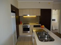 3 Parklands Blvd Brisbane City Qld 4000 Lifestyle, Location and Convenience is what this apartment has to offer. This seventh floor apartment overlooks 16 hectares of lush tropical parklands, and offers a home and a lifestyle like no other. The bedrooms are discretely separated for privacy. Upon entry you step through the open plan kitchen and living areas which have magnificent views to the Parklands. The balcony is easily accessible through the triple sliding glass doors for alfresco dining.