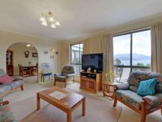 913 Oceana Dr Tranmere TAS 7018 Whale Of a Time Near the Water Land area: Approx 150m2 inc garage/workshop Land area: Approx 880m2 Offers around $415,000 SWEEPING views across the River Derwent to the city and Mt Wellington enhance this well presented, split-level family home with lovely mature gardens. Designed to maximize the outlook and sun through the day, the home is located in an established, harbour-side suburb on Hobart's eastern shore. The good sized block is very gently sloping with a cement driveway down to the under-house garage/workshop with a roller door and a single carport before the rear garden with its veggie plot and glass-house. A side porch-way provides access to a foyer with a terra cotta tile floor and a sliding door to the bright lounge with a Daikin air conditioner and the delightful views across the sparkling blue river. Adjoining is a dining area with a sliding door to a cosy sunroom and adjacent sundeck with harbour views. Also off the dining area is a functional Blackwood kitchen with good bench and cupboard space and including an upright stove with a ceramic cook-top and oven/grill, a stainless steel range-hood and there's a dishwasher. Two steps down is a family room with a storage heater and then a short hallway with a panel heater and linen press before three bedrooms with built-in storage and the master also having an en suite bathroom. The family bathroom is nearby and includes a toilet, while the laundry, with another handy loo off, is located to the rear of the garage and there also is good under-house storage. The property is close to transport and is about a10 minute drive from the schools, shops and other services at Howrah while the city centre is about 20 minutes by car. There are pleasant river-side walks in the area while yachts and other river traffic, porpoises and very occasionally whales provide an entertaining outlook from the living areas and deck. Property Snapshot Property Type: House Aspect Views: Harbour, City and Mountain Views House Size: 150.00 m2 Land Area: 880 m2 Features: Decking