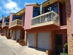 4/4 Vernon Street Scotts Head NSW 2447 Quality Property and Lifestyle Investment - price now $305,000. Whether you are looking for a great property investment, holiday getaway or sea change - this property is for you. This is a low maintenance property for no fuss beach living or rental. It's recently renovated with new kitchen, bathrooms, bamboo floors, new carpet in bedrooms and freshly painted. Key property features include: - Split level living - 3 bedroom and 2 bathrooms - Modern kitchen - Lots of storage and built-ins - Aluminium sliding doors and windows, fly screens and vertical blinds - Nice high ceilings with plenty of room - 2 verandahs, one with ocean views plus outdoor courtyard/garden - Separate laundry - Double lock up garage with inside access - Plus visitors parking and communal garden General Features Property Type: Townhouse Bedrooms: 3 Bathrooms: 2 Indoor Features Living Areas: 1 Toilets: 2 Floorboards Broadband Internet Available Built-in Wardrobes Pay TV Access Outdoor Features Remote Garage Secure Parking Garage Spaces: 2 Open Car Spaces: 2 Balcony Courtyard Outdoor Entertaining Area Fully Fenced Other Features Strata fees, rates and holiday rental fees available on request.