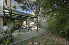 10 Cornish Place Holder ACT 2611 YES!! This IS Cornish Place, the tightly held cul de sac of Wilhelmsen designed townhouses that you have admired for years! And Yes! This property is separate title with lots of land, and HUGE potential to make it your dream- a low maintenance executive lifestyle home. My owner has added a wonderful Cedar and Glass study to the living areas in this property and there is still room in the backyard for a pool! The property has original kitchens and bathrooms, but there is new carpet, and RC/AC included. The property offers many classic 70's design features including raked ceilings, open plan living and ceiling height doors.