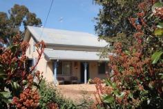 Katamatite VIC 3649 Situated on approx 1 acre of land and nestled amongst a wonderful array
of established trees and gardens, this home is looking for a new family.
Offering 3 good size bedrooms, 3 living areas, renovated bathroom, a
country style kitchen, heating and cooling, large shedding with 3
stables and Town water supplied to the property. A wonderful property
and a must to inspect.