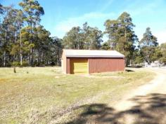 124 Forest Rd Rhyndaston TAS 7120 Farmlet Near Railway Town Rhyndaston is a very attractive little village where Tasmania's main railway line emerges on to the Oatlands plateau from a 955metre tunnel. Close to the township we are offering this 33.5ha farmlet for sale. Called "Kilfenora", which means Church of fertile lands, its 15 acres of pasture is fenced into 7 paddocks by excellent fences and is watered by 4 dams. The beautiful bush runs down to a creek and has around $20,000 worth of commercial timber or firewood. The two bedroom house is painted galvanised iron and is surrounded by a pretty garden. It also has a substantial workshop, pig and chook shelters plus a container for storing valuables.