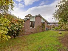 913 Oceana Dr Tranmere TAS 7018 Whale Of a Time Near the Water Land area: Approx 150m2 inc garage/workshop Land area: Approx 880m2 Offers around $415,000 SWEEPING views across the River Derwent to the city and Mt Wellington enhance this well presented, split-level family home with lovely mature gardens. Designed to maximize the outlook and sun through the day, the home is located in an established, harbour-side suburb on Hobart's eastern shore. The good sized block is very gently sloping with a cement driveway down to the under-house garage/workshop with a roller door and a single carport before the rear garden with its veggie plot and glass-house. A side porch-way provides access to a foyer with a terra cotta tile floor and a sliding door to the bright lounge with a Daikin air conditioner and the delightful views across the sparkling blue river. Adjoining is a dining area with a sliding door to a cosy sunroom and adjacent sundeck with harbour views. Also off the dining area is a functional Blackwood kitchen with good bench and cupboard space and including an upright stove with a ceramic cook-top and oven/grill, a stainless steel range-hood and there's a dishwasher. Two steps down is a family room with a storage heater and then a short hallway with a panel heater and linen press before three bedrooms with built-in storage and the master also having an en suite bathroom. The family bathroom is nearby and includes a toilet, while the laundry, with another handy loo off, is located to the rear of the garage and there also is good under-house storage. The property is close to transport and is about a10 minute drive from the schools, shops and other services at Howrah while the city centre is about 20 minutes by car. There are pleasant river-side walks in the area while yachts and other river traffic, porpoises and very occasionally whales provide an entertaining outlook from the living areas and deck. Property Snapshot Property Type: House Aspect Views: Harbour, City and Mountain Views House Size: 150.00 m2 Land Area: 880 m2 Features: Decking
