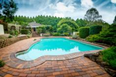 40 Tyringham Road Dorrigo NSW 2453 Your Very Own Piece Of Paradise Drive in the driveway and be blown away by this incredible home, it truly is breath taking from the lovely gardens to the picturesque pool and beautiful views. As you would expect, the home itself will NOT disappoint with 3 good sized bedrooms, 2 with built inns, recently renovated bathroom and kitchen and gorgeous hard to come by brick fire place perfect for those winter nights. If entertaining is for you well look no further, with a HUGE undercover entertaining area at the rear conveniently located close to the kitchen and swimming pool this property truly is an entertainers delight. And if that's not enough to have you booking the removalist, here are a few more points to remember, but really with a property like this no words can describe its beauty. So don't miss out, book your private inspection today. - 2166m2 parcel of perfection - Wooden floors - Gas hot water - Ceiling fans - New pool pump - Extra room separately enclosed at the rear of the SLUG with plenty of potential - 2 toilets - Larger than average pantry - Good sized work shop and 4 car garage separate to the house (with power) - Plus much, much more General Features Property Type: House Bedrooms: 3 Bathrooms: 1 Land Size: 2166 m² (approx) Outdoor Features Carport Spaces: 1 Garage Spaces: 5 Courtyard Other Features Dining Room, Outdoor Living, Pool