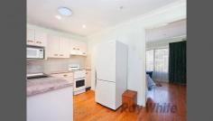 22 Scenic Drive Budgewoi NSW 2262 In Town Convenience High set with water views and favoured north-easterly aspect to capture soothing summer breezes and warm winter sunshine, this 2 bedroom home with built-ins, family room and the nostalgia of easy-care polished timber floors throughout is just a stroll from community shopping centres, lake and ocean beaches. With modern bathroom and lots of extras including air conditioning, first home buyers and investors will find much to please them in a home that has lots more on offer than the price suggests so call today for inspection. General Features Property Type: House Bedrooms: 2 Bathrooms: 1 Land Size: 575 m² (approx) Outdoor Features Garage Spaces: 1