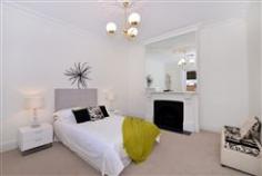 39 Rose Street Glenelg SA 5045 Charming Single Fronted Cottage - Circa 1900 Auction: Saturday 11th October @ 12.30 p.m. (U.S.P.) Set in the heart of cosmopolitan Glenelg and with-in easy reach of Jetty Road shopping, cafe's and the beach, this exquisite bluestone fronted cottage provides easy living for today whilst maintaining all of the period features and keeping within the era. There is a high fence at the front offering privacy and a walk along the path to the welcoming ambience of the residence. With high ceilings, polished timber floors, ornate fireplaces, ornate cornices and leadlight features, this one is sure to impress all character enthusiasts. The home boasts an impressive wide entrance hall and two generous bedrooms. The gorgeous lounge with feature gas fireplace and French doors is the perfect spot to relax, or walk through to the open plan kitchen meals or open the doors to encompass the wonderful outdoor entertaining area. A private rear yard has lawn for the pets and the undercover pergola is sensational whether entertaining for two or a crowd. The spacious bathroom has a large shower and bath, with a separate neat and compact laundry. General Features Property Type: House Bedrooms: 2 Bathrooms: 1 Outdoor Features Garage Spaces: 2 Other Features Property Type: House