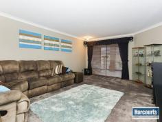 42 Conti Road Tapping WA 6065 If you're looking for space and a home that grows around the family then you've definitely found it with this Celebration home. A large games room that'll keep the kids entertained for hours and a spacious theatre room at the front of the home for those family movie nights. Everything in this home is on the large side even starting from the double door entrance. All bedrooms are large with built in robes and the master bedroom is huge with walk in robe. The ensuite has a spa where you can relax in the bubbles with a glass of champers. There's room to cook for 5000 in the large open plan kitchen which over flows into the family dining area. The outdoor under cover area is ideal for taking shelter from those hot sunny days and a grassed area which is ideal for the kids and pets to play or potential room for that pool. The Brady Bunch would be happy with this one! Easy reach to Carramar Shopping Centre, Drovers Market and a short 7 minute drive to the freeway (approx). - See more at: http://premier.harcourts.com.au/Property/580058/WPM3854/42-Conti-Road#sthash.CpI01VlO.dpuf