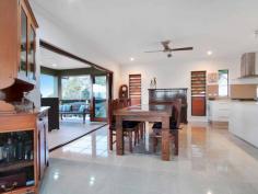 Perched high on the hill with sweeping 180-degree views from Mount
Bartle frère through to the Gordonvale, southern suburbs and Cairns CBD
this immaculately home blurs the lines between contemporary chic and low
maintenance comfort. Stylish open plan living and dining area
merge together effortlessly, spilling onto a covered entertaining deck.
Carefully detailed throughout, it incorporates the finest fittings and
finishes from wrought iron entrance, French stacker bi-fold doors and
LED lighting. A state of the art kitchen offers supreme functionality
without sacrificing on style. Striking reconstituted granite benches,
sleek cabinetry, high quality European appliances and a full walk in
pantry complete this gourmet space. There are three large bedrooms
serviced by two stylish bathrooms. The master is lavish yet relaxed with
natural tones, large walk through private dressing room and luxury
ensuite with free standing bath tub. Other exceptional features include; - Large Study - Double Lock Up Garage - Surround Sound - 1.5 Solar power - 3Kw inverter - Heat hot water - 5000L water tank (plumbed into the restrooms & laundry), Owners water bill can even be as low as $30 p/qtr Positioned
on a large 1,347 square metres on the top of Cribwood Close in the
heart of bustling Mount Sheridan, this home offers all of the lifestyle
and convenience you could possibly ask for. The freshly refurbished
Mount Sheridan Plaza is just a stone throw away, and the CBD is a mere
15 minutes away.
