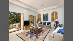 26a Coronation Avenue, Mosman, NSW 2088 Balmoral Beach Retreat - Resort-Style Gardens Reminiscent of a luxurious tropical resort, this incredibly private family retreat is tucked away in a secluded enclave overlooking idyllic Balmoral Oval. Created with a focus on alfresco living with all principal rooms opening outdoors, it has been designed to embrace a lush north facing garden oasis with heated pool and entertainer's cabana. It enjoys a tightly held dress circle setting on the Balmoral Slopes, just a short stroll to the beach, harbourfront dining and parkland. - Designed by award-winning firm Harrington Architects - Auto gated driveway access with video intercom security - 4 beds with built-ins, deluxe Saturnia stone baths - Private master suite with study, dressing room & terrace - Huge living room & formal dining room, Jetmaster fireplace - Sun drenched casual living wrapped in garden terraces - Gourmet granite gas kitchen overlooking the sparkling pool - Internal access to a double garage, gym, ducted air - Chic guest powder room, huge hidden laundry/utilities room