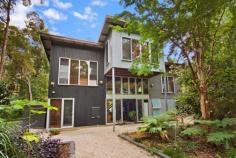 43 Lilli Pilli Dr Byron Bay NSW 2481 If unusual architecture and a private treed location in the heart of Byron (but removed from the tourists) is your desire, then this property shines. The home is made for entertaining with concertina doors front and back overlooking the lush greenery of the landscaped gardens and onto the in ground pool flowing through into the nature reserve. A series of platforms over three levels lends itself to different uses - Sleep among the treetops or down on ground level. Move the configuration of the downstairs walls around if you need more room for entertaining. A truly unique and individual home that will surprise and excite you in the innovative design which would inspire even the weariest of souls. Stainless steel appliances, fans and stainless screens and all new pool equipment means you can throw away the mower and recline by the pool. This is truly a Byron style home capturing the essence of nature at your doorstep with peace and tranquility but maximising the privacy which also allows for the natural light and modern decor to shine.