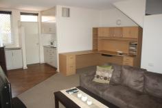 57/111 Bloomfield St Gillen NT 0870 This unit is located in the Gap Estate which is approx. 3.2kms from the town center. The complex itself has a large swimming pool to relax during the warm summer days. The two bedroom townhouse is neatly presented with open plan living area downstairs and split system air conditioning. All furniture is in good condition and includes couch, study desk, white goods and bed. Upstairs there are two bedrooms with built-ins and split system air conditioning. The second bedroom has a balcony with views of the ranges. The bathroom has shower, toilet and vanity. Downstairs you have a private courtyard that is beautifully designed with paving, artificial grass and a garden bed. A great place to have BBQ while you enjoy the views of the ranges. Undercover parking out the front and only side neighbours is very appealing.
